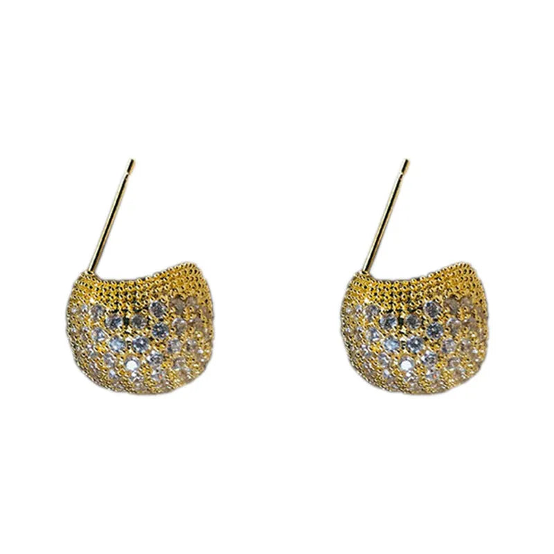 Women's drop-shaped clip earrings with full diamond elements and golden beans detailing