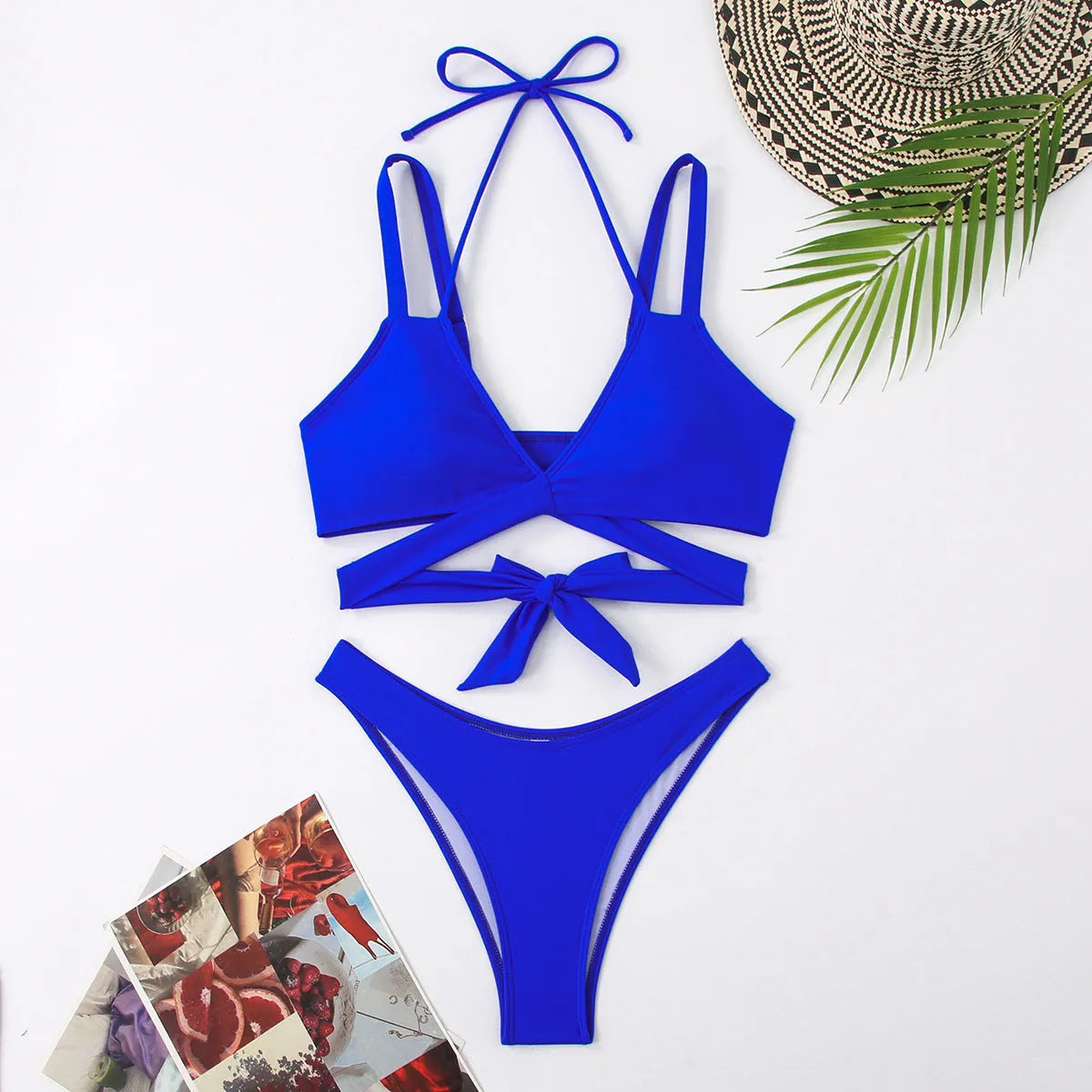 Solid colour strap bikini swimsuit for women on a mannequin, showing the brief cut and sleeveless design.