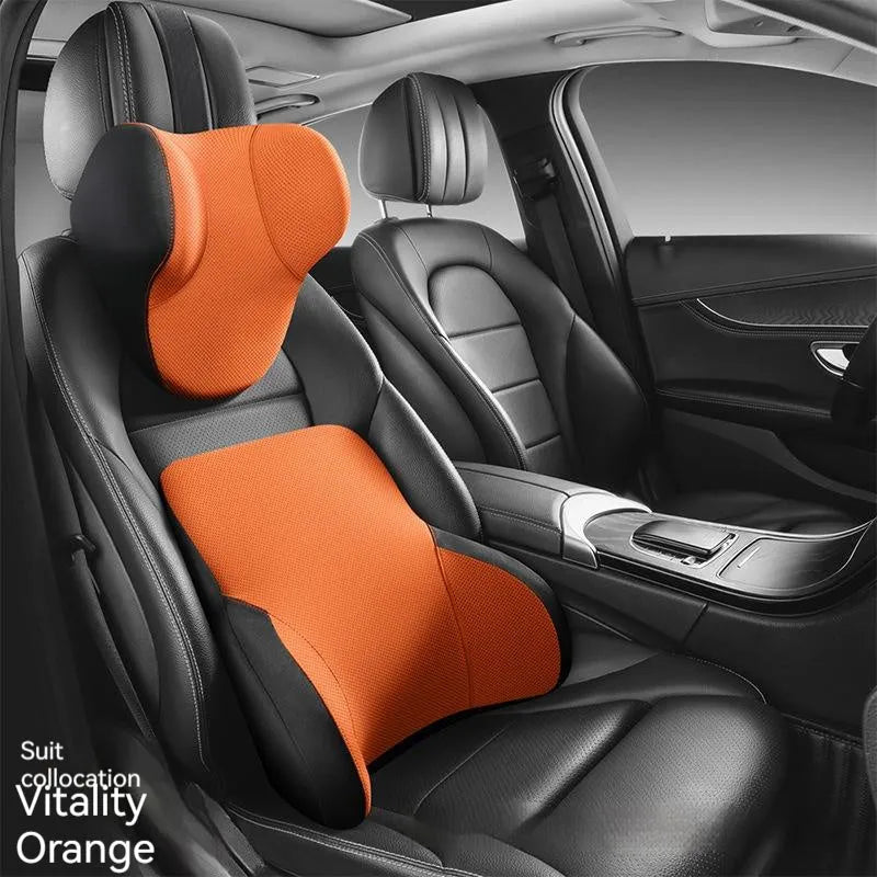 Black memory foam car headrest and lumbar support pillow set on a car seat
