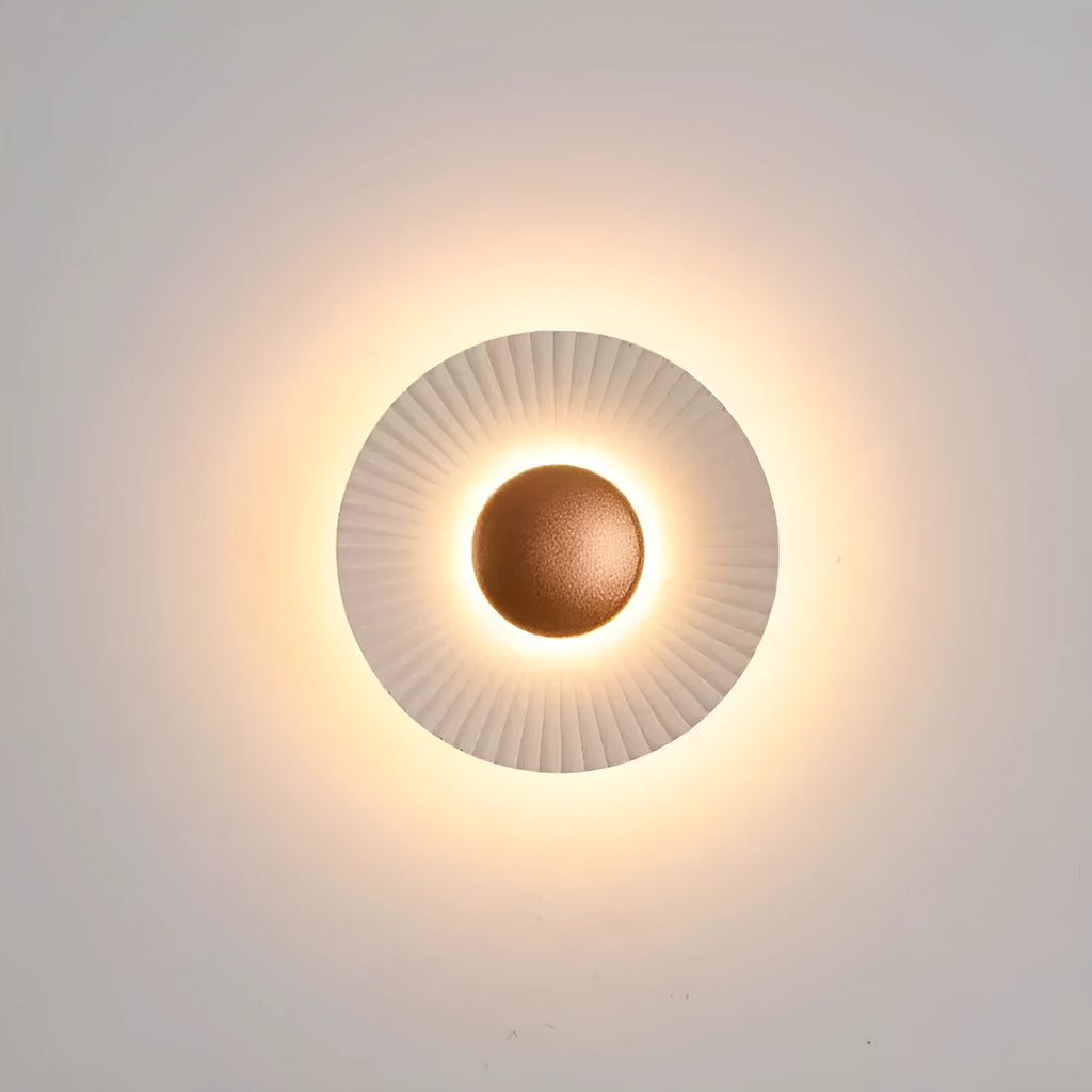 Round aluminium wall lamp with LED light in a choice of six colour finishes.