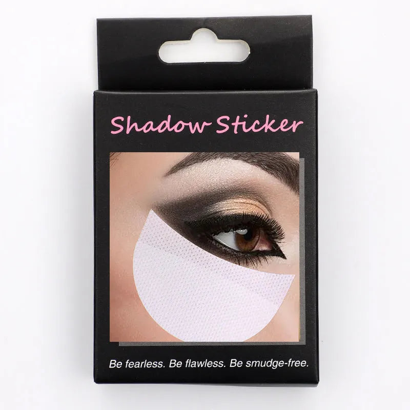 Pack of disposable half-moon shaped eyeshadow shields on a pink background