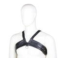 Black leather adjustable men's chest strap harness laid flat on a neutral background with adjustable fastener visible