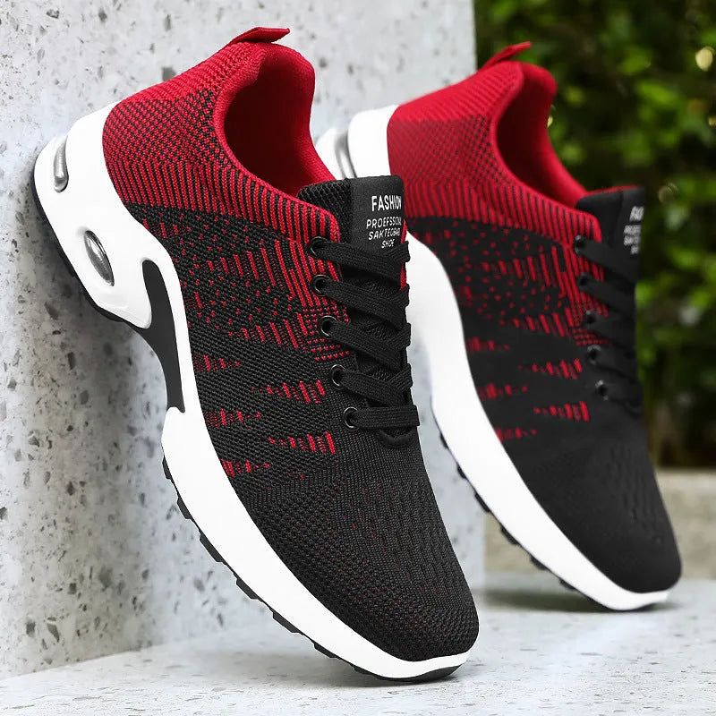 Men's low-top Flyknit mesh sneakers in black and grey colourway with lace-up front