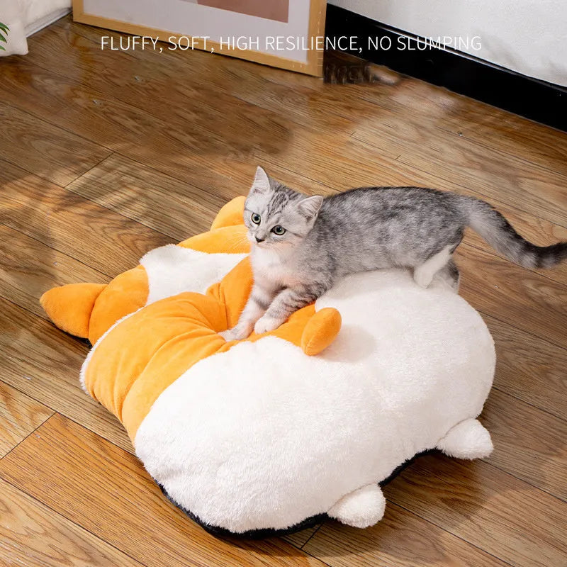 Orange semi-closed cat sleeping bag bed measuring 65 cm by 53 cm