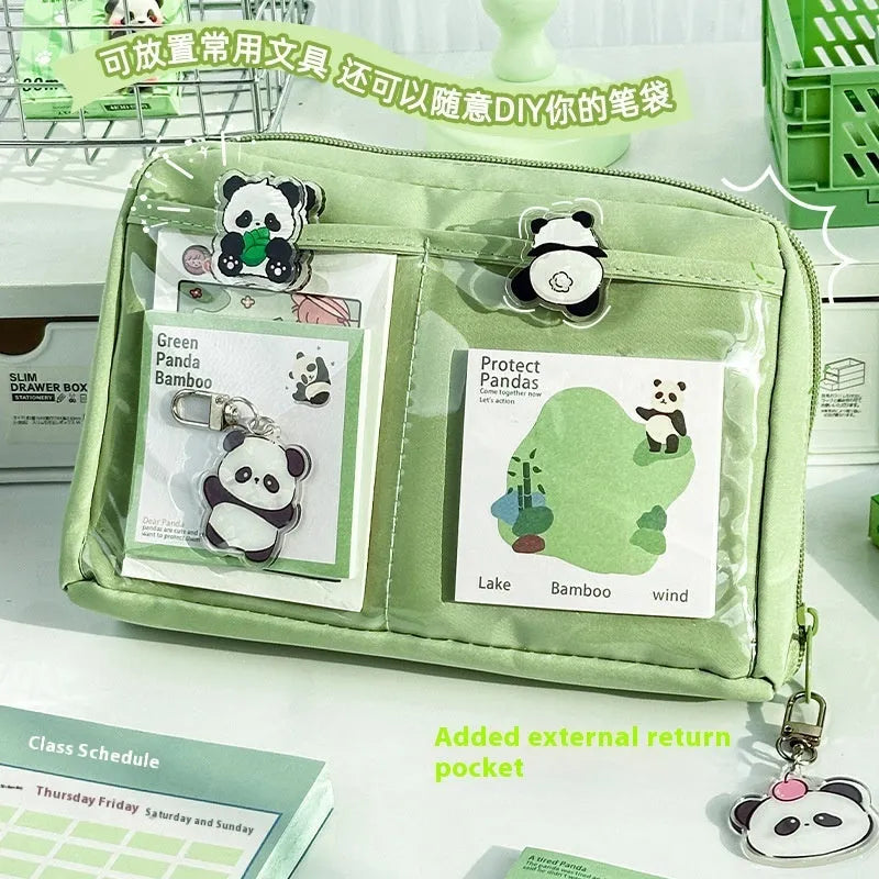 Green canvas pencil case with panda design featuring 12 internal layers for organising pens and stationery.