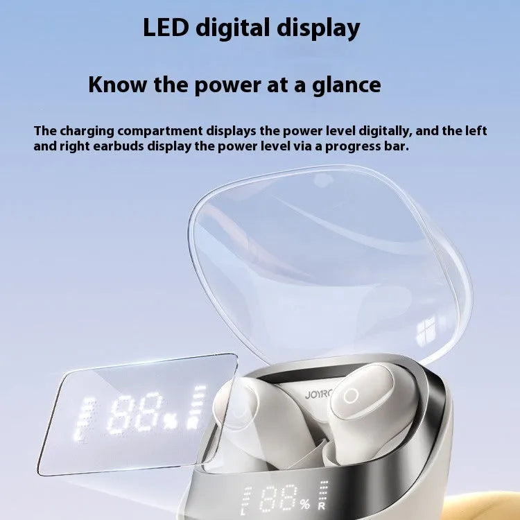 Beige wireless in-ear Bluetooth headphones with a compact white charging case on a table