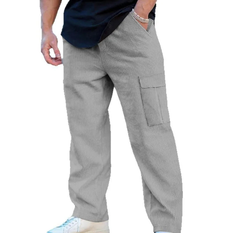 Men's straight-leg corduroy trousers in navy blue with an elasticated drawstring waist.
