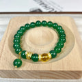 Handcrafted green chalcedony wealth snake and red agate beaded bracelet with copper components.
