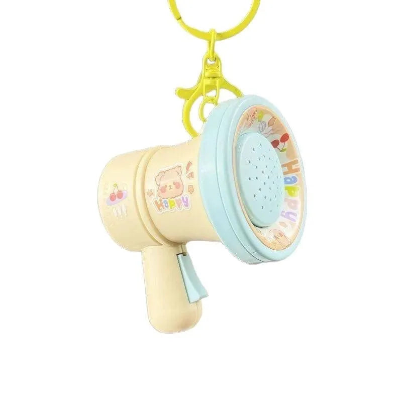 Green and yellow plastic cartoon horn keychain ornament with cute style design