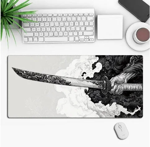 Large black anime-themed gaming mouse pad with non-slip rubber base on a wooden desk.