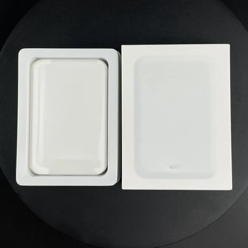 White magnetic wireless power bank showing compact 100x65x16mm dimensions with wireless charging surface