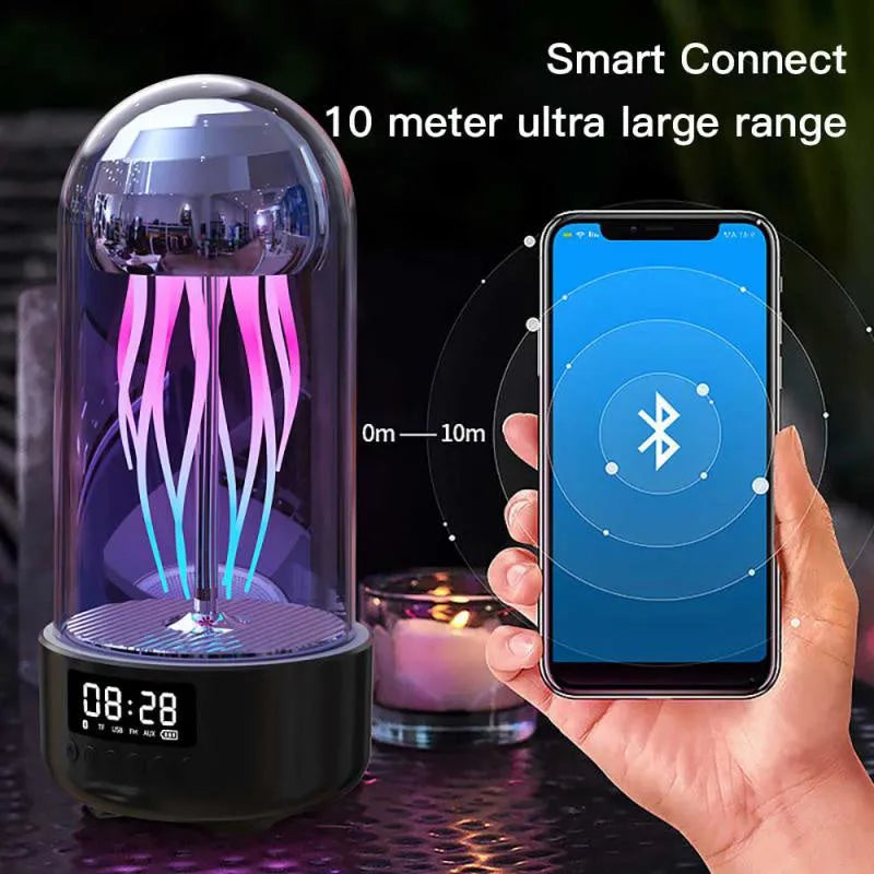 Grey pink purple Bluetooth speaker with jellyfish mood lighting effects and LED clock display screen