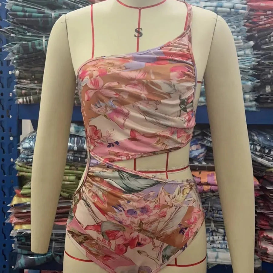 Women's rose gold patterned swimsuit in polyester fabric showing front design
