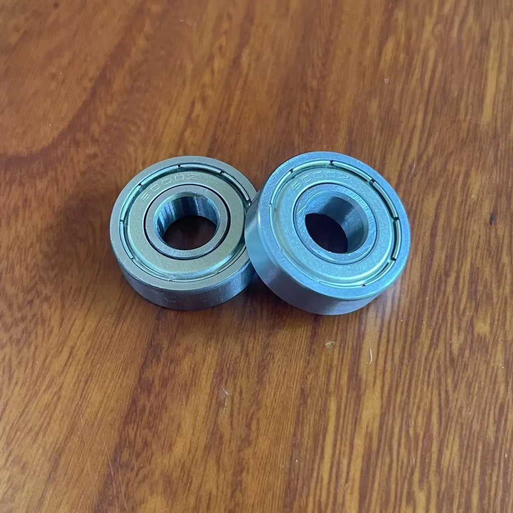 6000z carbon steel ball bearing with 10mm inner diameter, 26mm outer diameter, and 8mm width on a white background.