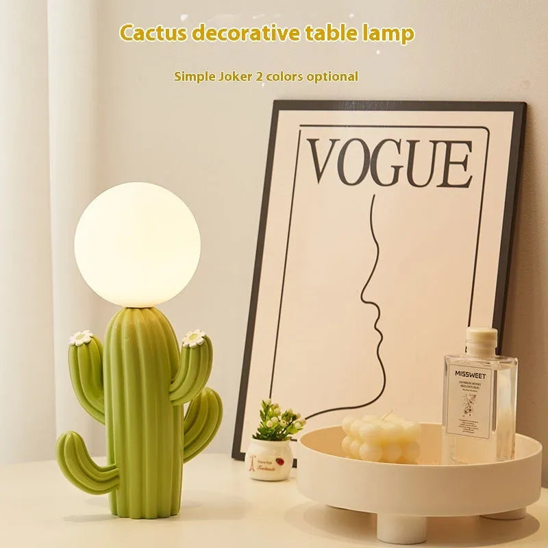 Green cactus button desk lamp with three-colour accents on a bedside table in a child's room
