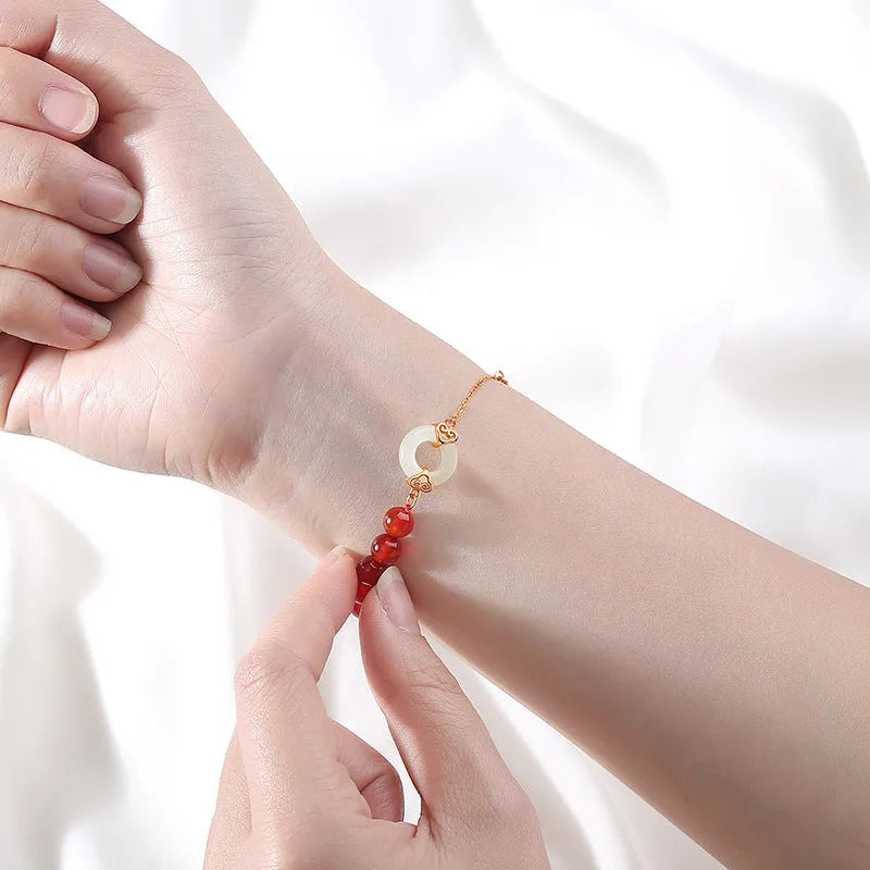 Women's sterling silver 925 bracelet with peace buckle charm and traditional Xiangyun design