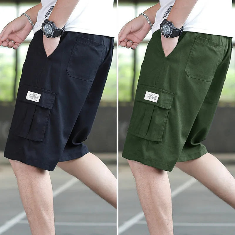Man wearing loose fit khaki Korean style cargo trousers with a slim silhouette.