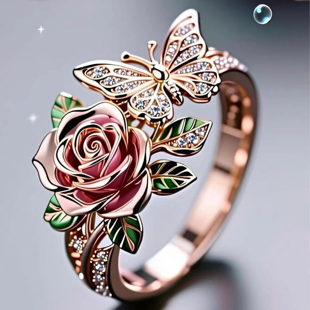 Close-up of an adjustable alloy butterfly ring with colourful oil-drip finish and floral details.