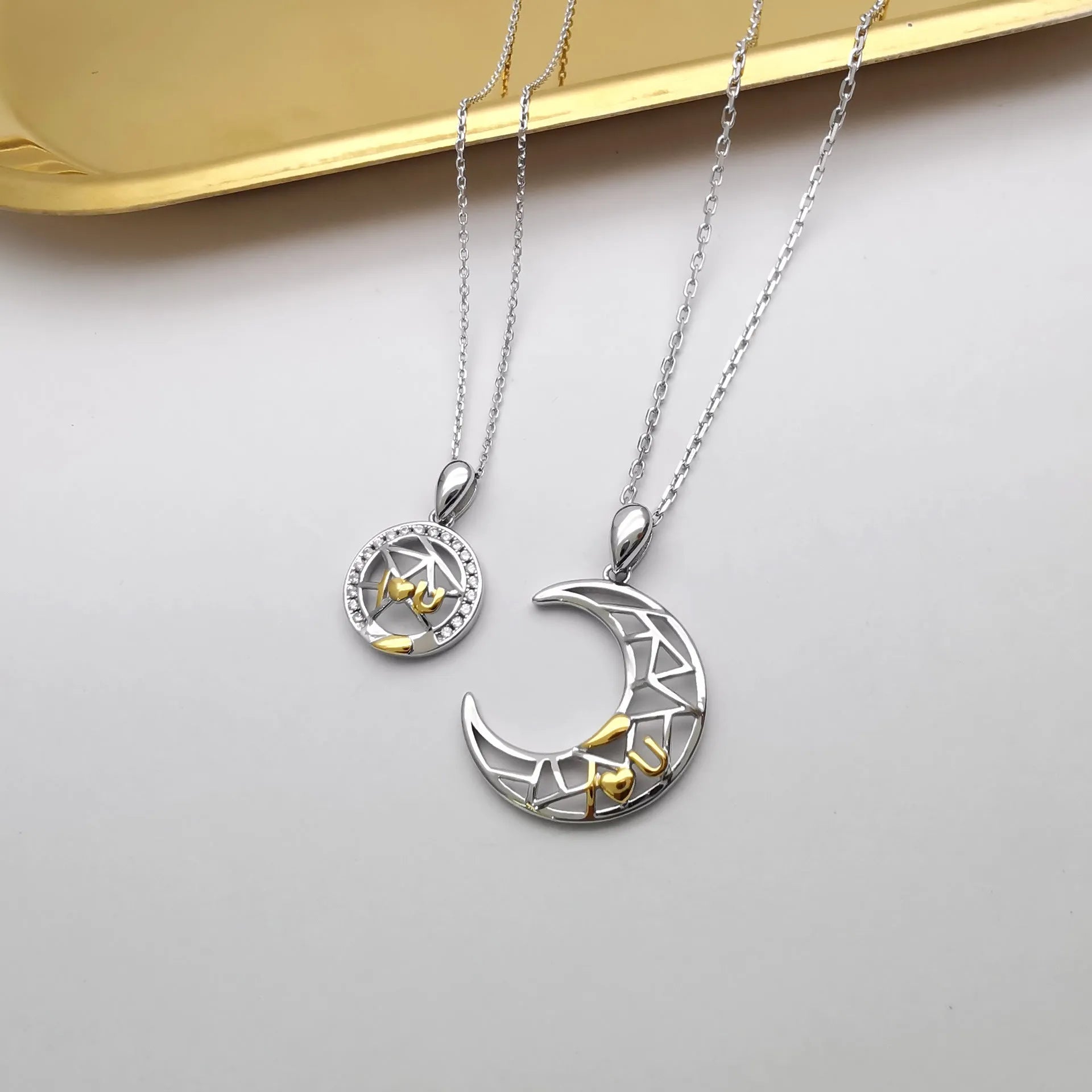 Sun moon couple necklace set with electroplated copper pendants on cross chains