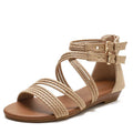 Women's light green cross-strap Roman sandals with a thick wedge sole and back zipper.