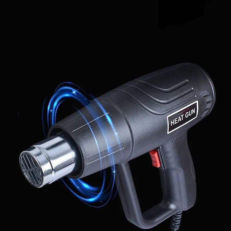 A black 2000W hot air gun with a two-speed switch and grid-pattern air outlet.