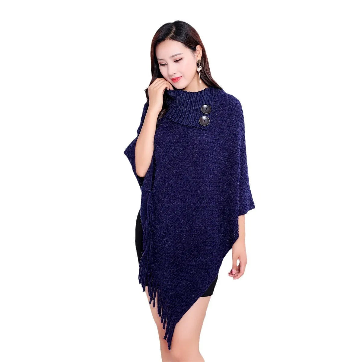 Women's sleeveless knit shawl cloak with dotted pattern in acrylic fibre shown in various colours