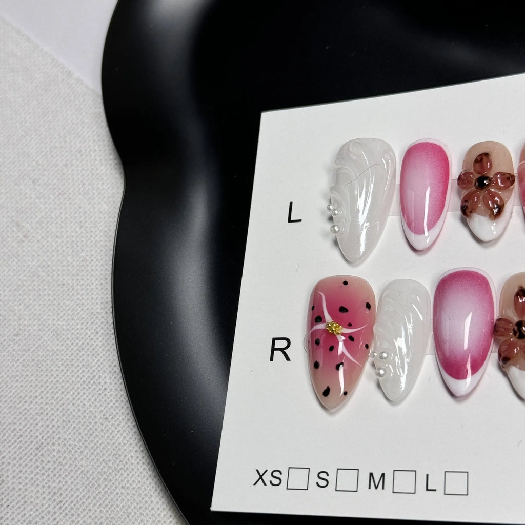 Hand-painted three-dimensional carved plastic nail patches with embossed candy patterns in almond shape