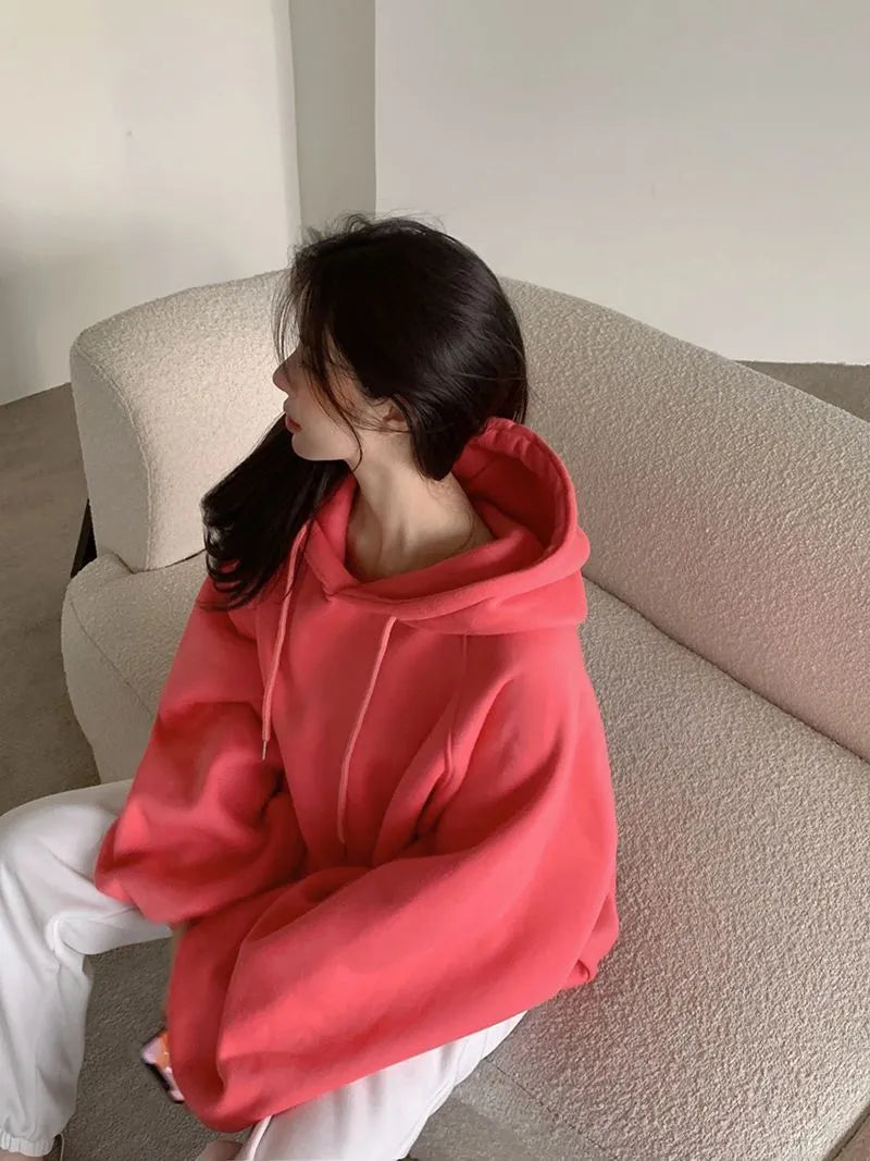 Watermelon red women's sleeveless hooded sweater made from Mulberry Silk, loose pullover style.