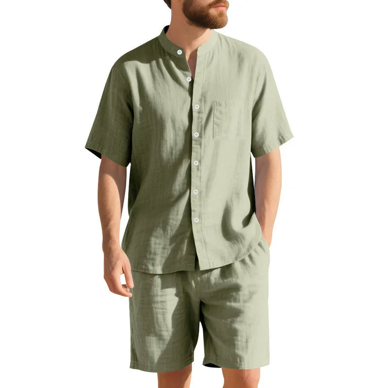 Men's light blue linen blend summer suit with short sleeves and shorts on a hanger.
