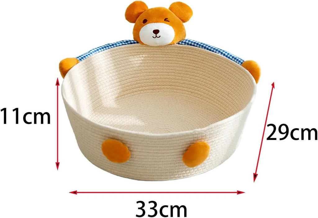 Woven cotton rope cat bed with scratching surface, shown with bear decoration in medium size.