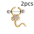 Gold scorpion belly ring with 316L medical steel bar and crystal diamond inlay on white background