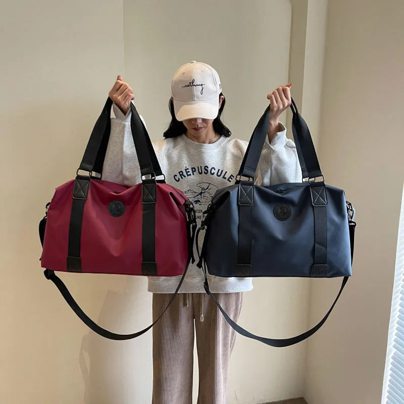 Large waterproof Oxford cloth travel bag with 36-55L capacity in solid colour options
