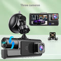 Black WiFi dash cam with 2-inch screen mounted on car windscreen, showing live rear camera view for parking.