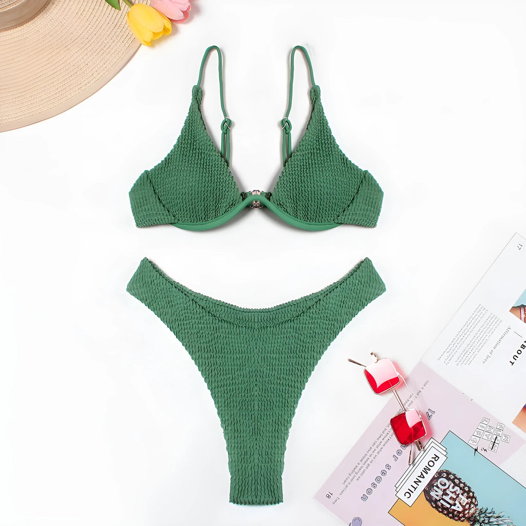 Green women's bikini swimsuit with ruffle detailing and briefs style