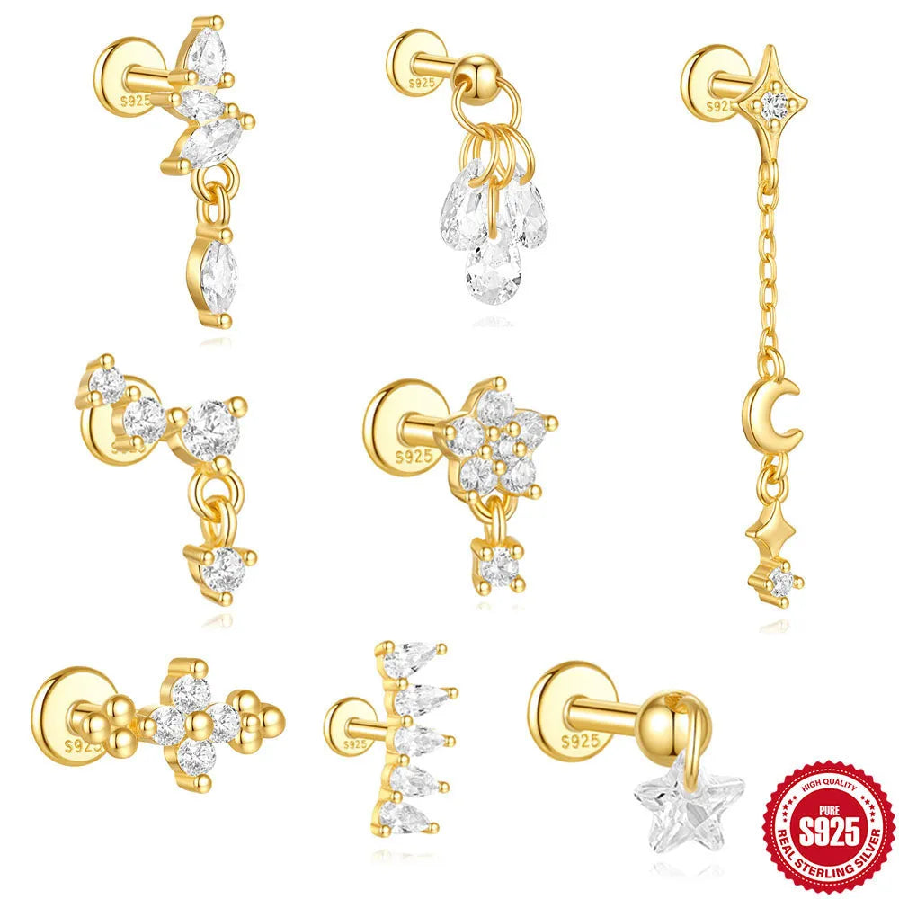 S925 sterling silver moon and star shaped earrings with diamond details on a gold-tone finish.