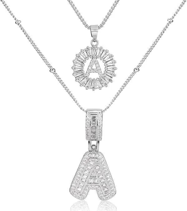 26 English letters copper-plated gold diamond initial pendant necklace with adjustable chain on display