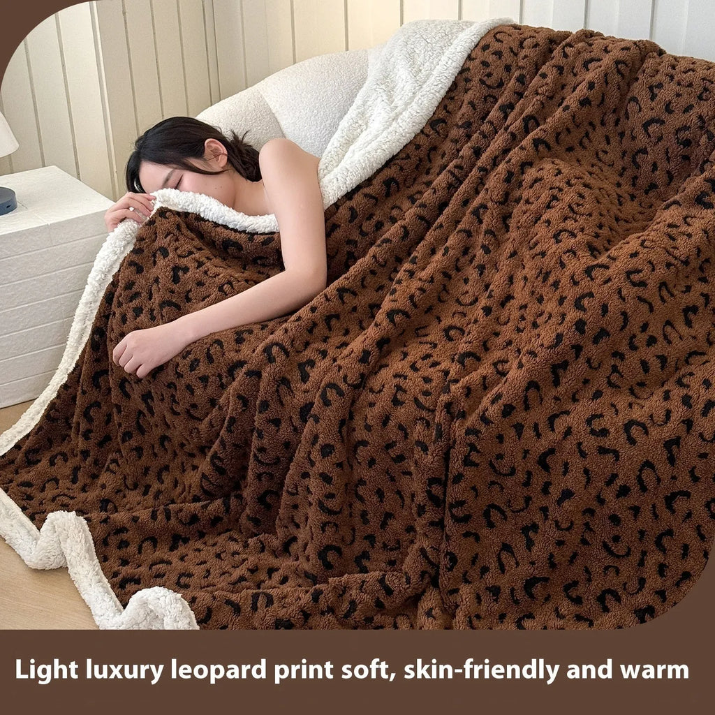 Double-layer cationic jacquard taffeta blanket with leopard print pattern in camel colour.