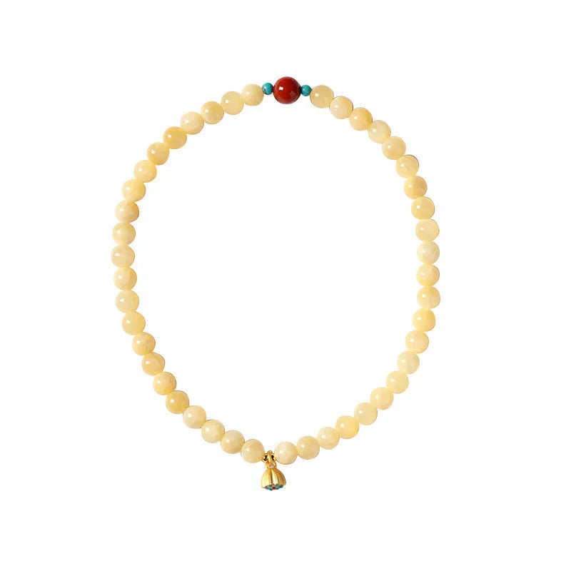 Yellow jade handmade bracelet with lotus seedpod design and double ring structure