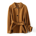 Yellow Brown loose-fit cashmere coat with Peter Pan collar and leather stitching details on front.