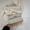 Casual PU crossbody shoulder bag in black with minimal design and strap