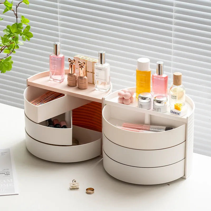 Rotating cosmetics storage box in white or pink, plastic, 27x15.5x19.5cm, for makeup and toiletries.