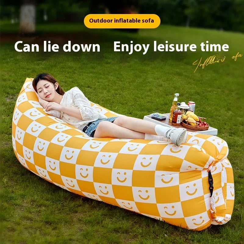 Inflatable lazy sofa in outdoor setting with Oxford cloth surface and colourful design options