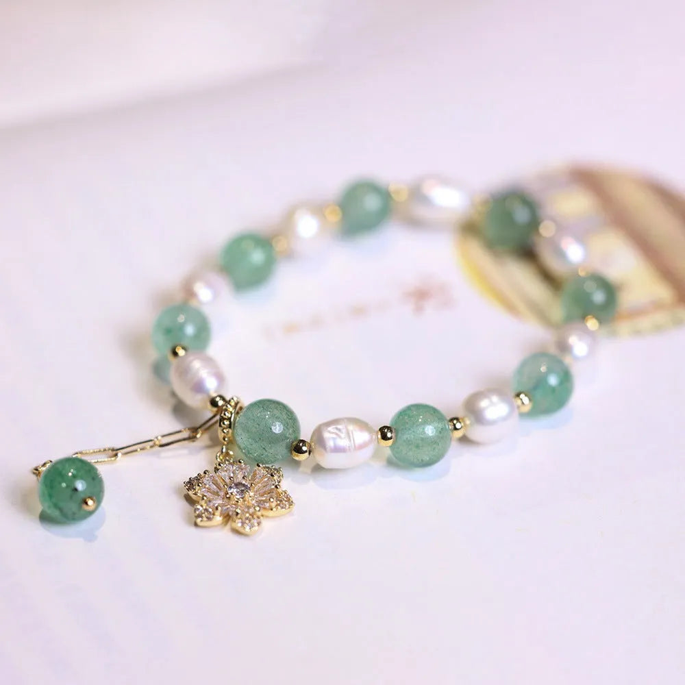 Handmade green strawberry freshwater pearl bracelet with peace buckle and hanging flower charm