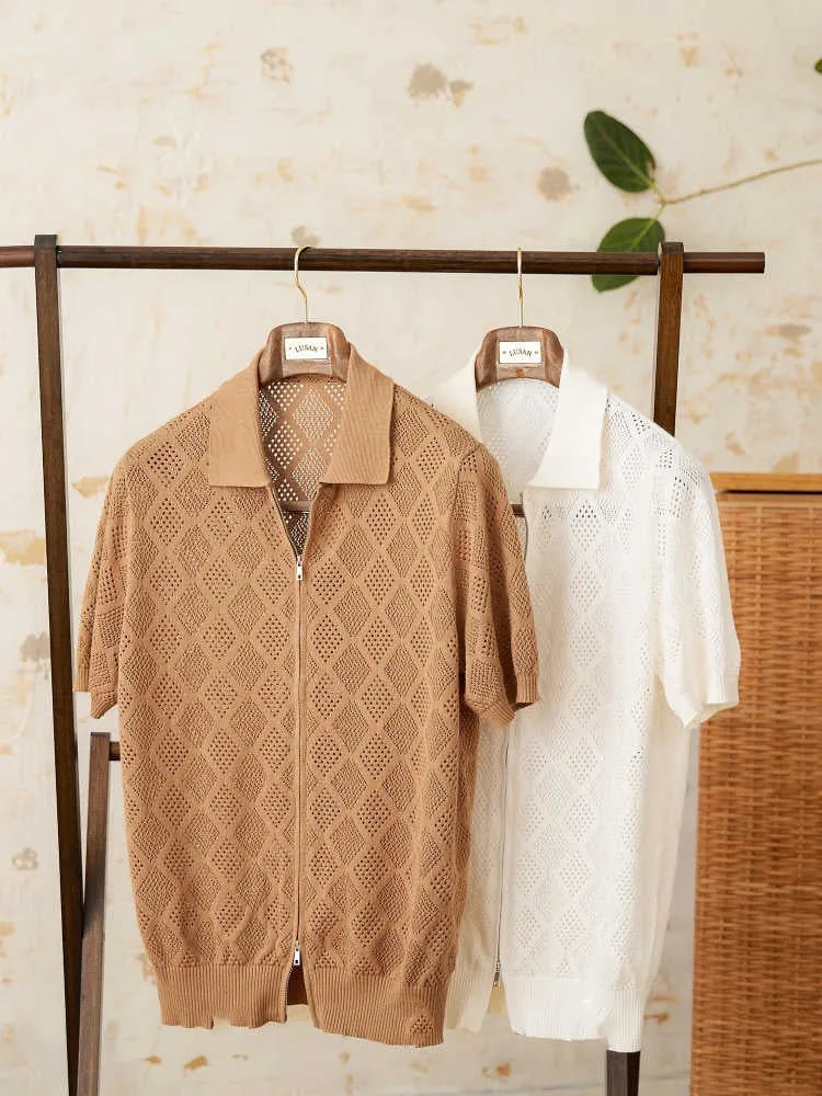 Light brown cotton short sleeve cardigan with zipper front and lapel collar on a hanger.