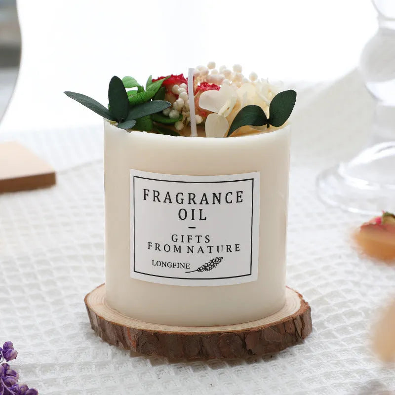 Dried flowers decor romantic aromatherapy candle in a jar with embedded botanicals.