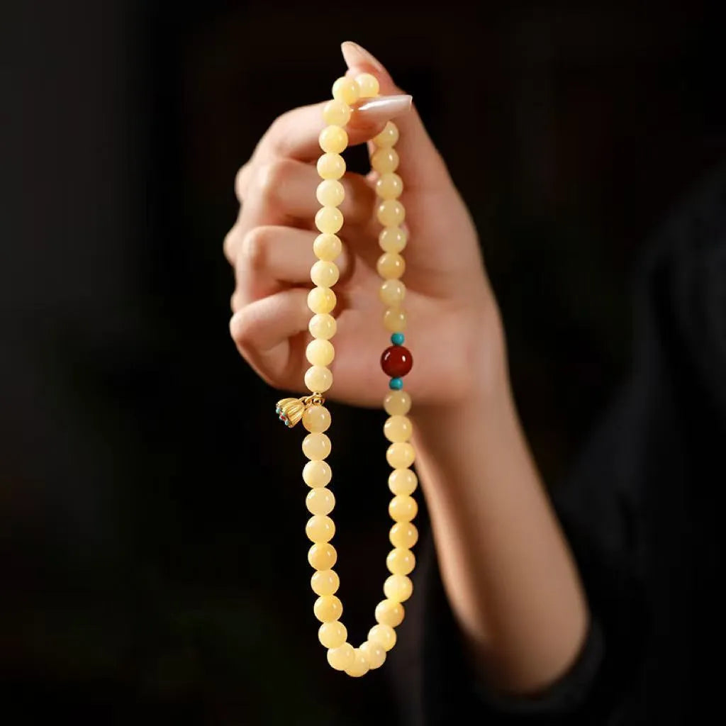 Yellow jade handmade bracelet with lotus seedpod design and double ring structure