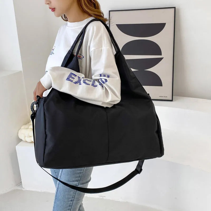 Women's large capacity Oxford cloth yoga bag with dry and wet separation in grey, shown with a yoga mat and laptop inside