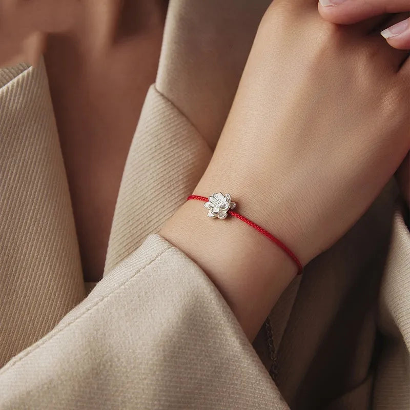 Original S925 silver lotus red rope bracelet for women, simple floral design on white background