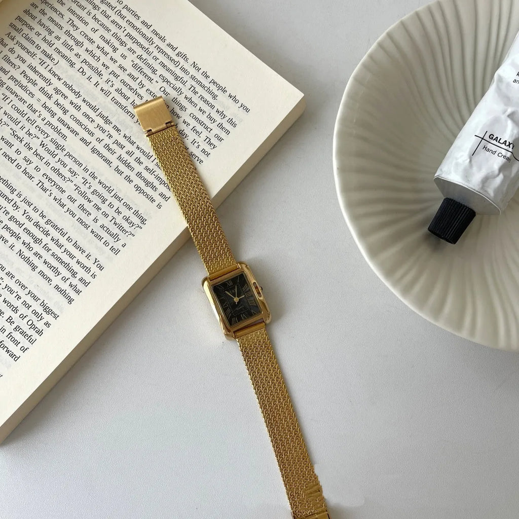 Lady's Roman retro square quartz watch with metal strap and glass face