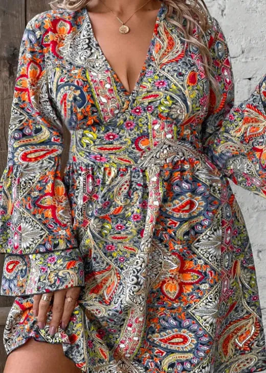 Plus size women's bell sleeve dress in printed polyester with A-line skirt and V-neck design